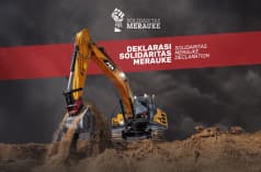 Halaman pertama "Deklarasi Solidaritas Merauke" dengan foto ekskavator